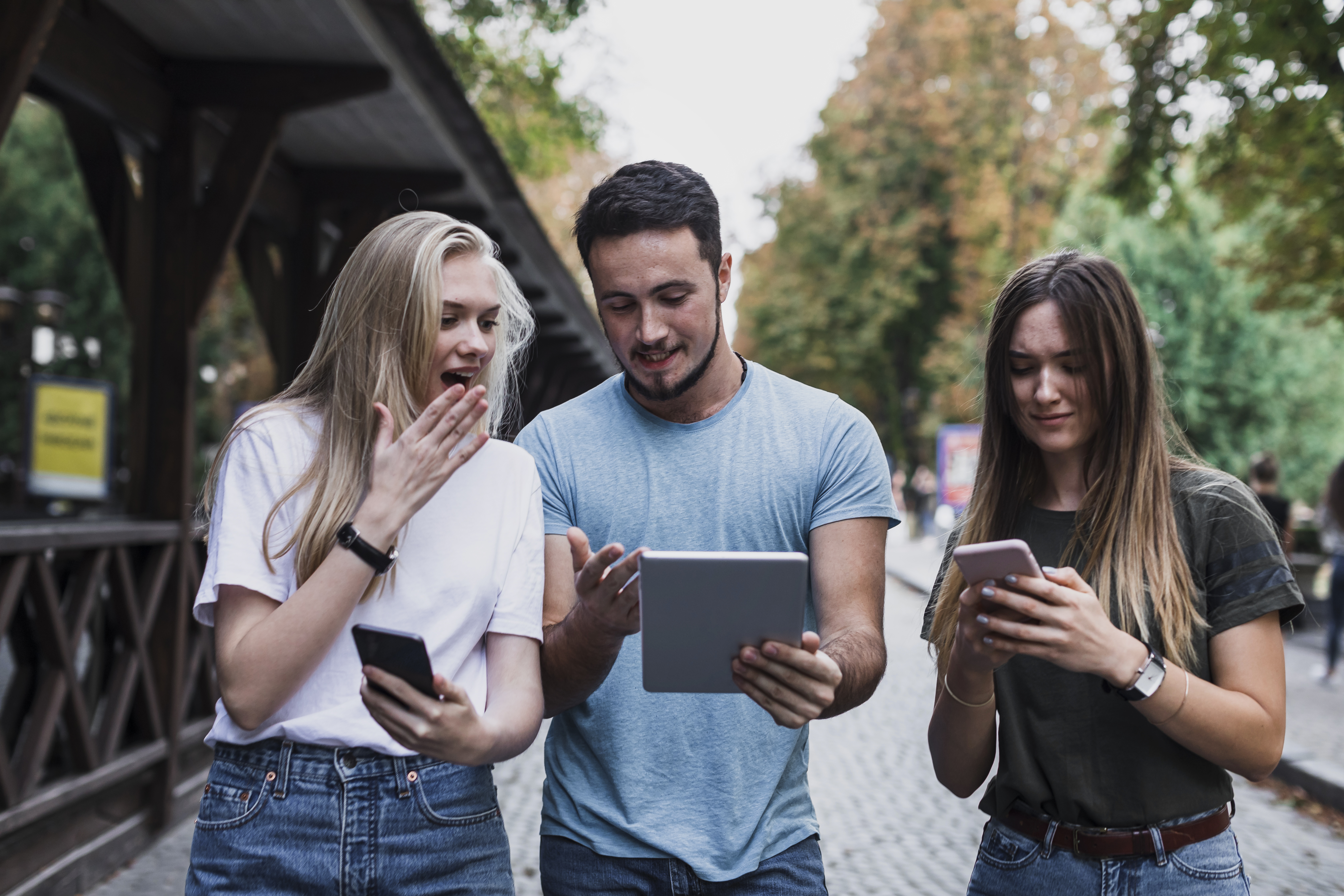 man-showing-internet-post-his-friends