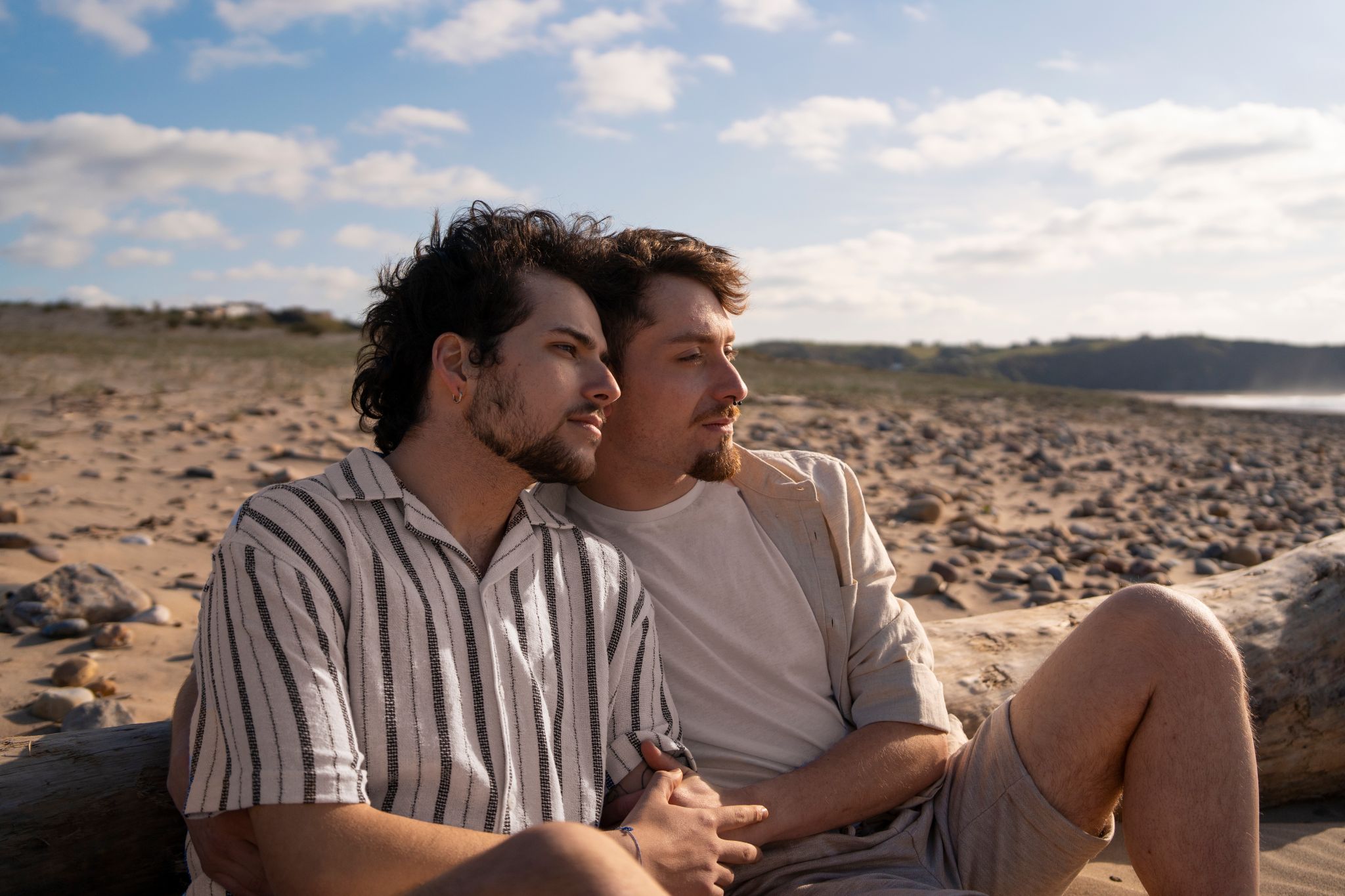 gay couple beach
