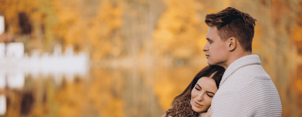 man and woman balcony